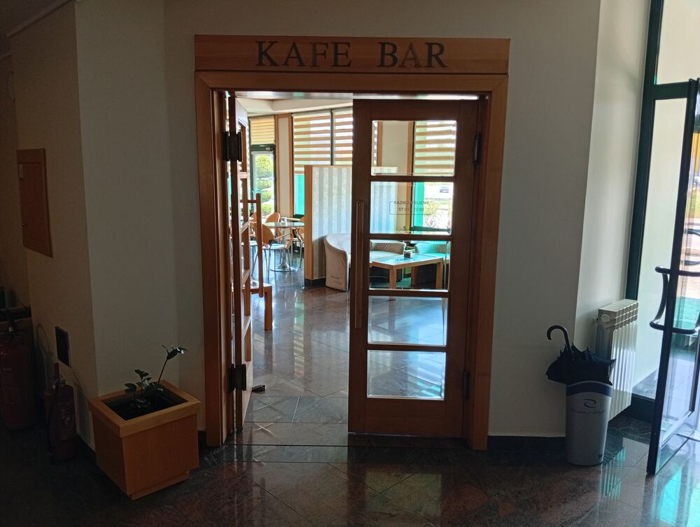 Kafe Bar entrance — open 07:00–23:00